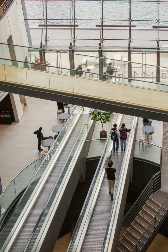 People standing on moving walkways